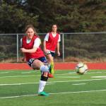 Homers Brenna McCarron sends the ball up the field during a Tuesday, April 9, 2019 game against Soldotna High School in Homer, Alaska. The teams tied the game 3-3. (Photo by Megan Pacer/Homer News)