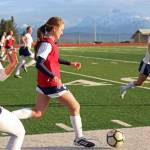 Homers Eve Brau takes the ball up the field during a game against Soldotna High School on Tuesday, April 9, 2019 in Homer, Alaska. The teams tied the game 3-3. (Photo by Megan Pacer/Homer News)