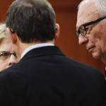 Rep. Tammie Wilson, R-North Pole, left, speaks with Rep. George Rauscher, R-Anchorage, center, and Rep. Steve Thompson, R-Fairbanks, on the House floor as amendments to the budget are proposed on Tuesday, April 9, 2019. (Michael Penn | Juneau Empire)