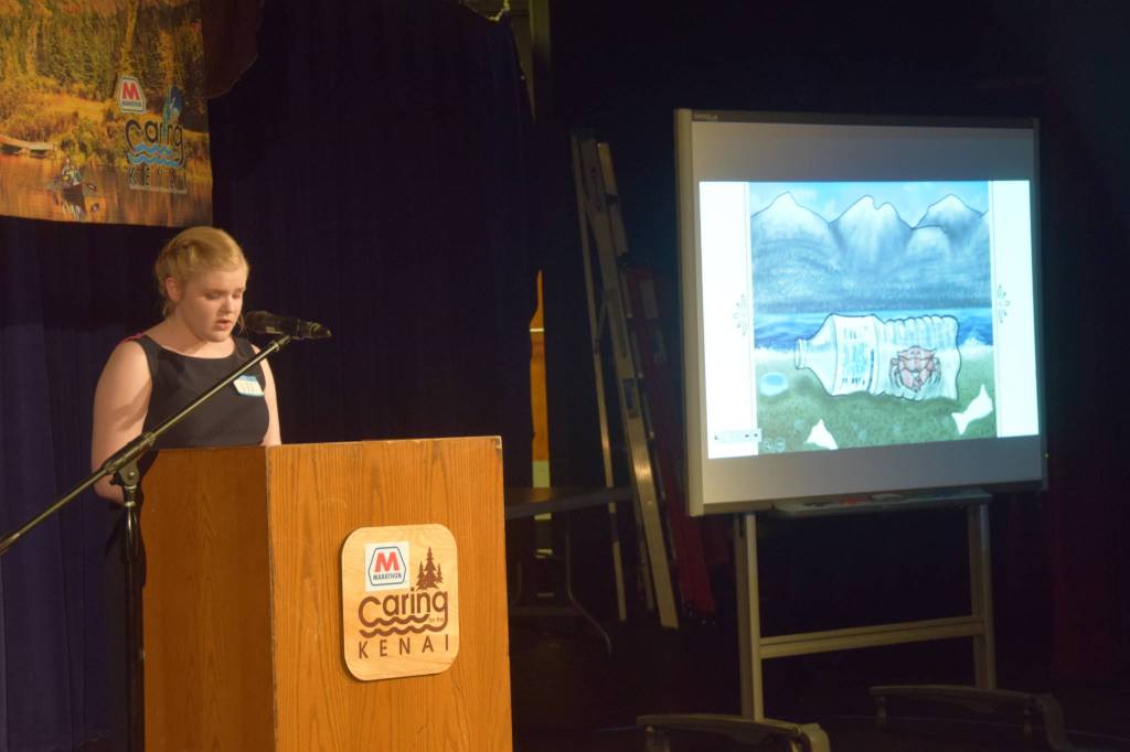 Homer High School student and fourth-place winner Viannne Sarber presents her project during the Caring for the Kenai contest at Kenai Central High School in Alaska on Thursday, April 18, 2019. (Photo by Brian Mazurek/Peninsula Clarion)