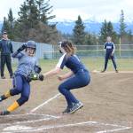 SoHi softball catcher Casey tags out Homer High School Mariner Grace Godfrey as she tries for home plate in a game against the Homer High School Mariners on Tuesday, April 30, 2019, at Jack Gist Park in Homer, Alaska. Godfrey later redeemed herself with a grand slam home run. (Photo by Michael Armstrong/Homer News)