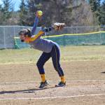 Pitcher Annalynn Brown winds up to send a ball over the plate during the Homer Mariners Saturday, April 27, 2019, game against the Kodiak Bears at Jack Gist Park in Homer, Alaska. (Photo by McKibben Jackinsky)