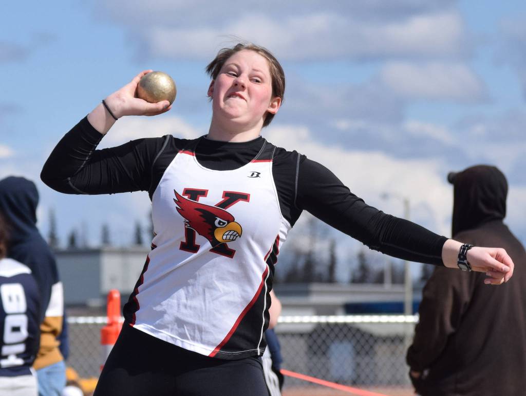Kenais Grace Morrow unleashes a heave in the girls shot put throw Saturday, May 4, 2019, at the Kenai Invitational track meet at Kenai Central High School. (Photo by Joey Klecka/Peninsula Clarion)