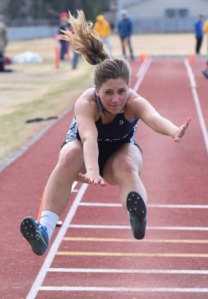 Soldotnas Kylie Ness makes an attempt in the girls triple jump Saturday, May 4, 2019, at the Kenai Invitational track meet at Kenai Central High School. (Photo by Joey Klecka/Peninsula Clarion)