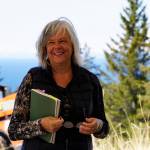 The first Storyknife fellow, Kim Steutermann Rogers of Kauai, Hawaii, speaks at groundbreaking ceremonies last Saturday, May 4, 2019, at the retreat property in Homer, Alaska. Construction started this month on the main house and cabins that will in a year house visiting women writers. (Photo by Michael Armstrong/Homer News)