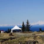Visitors walk toward the site of the Storyknife Writers Retreat in Homer, Alaska, last Saturday, May 4, 2019, at groundbreaking ceremonies for the main house and cabins that will house visiting women writers. (Photo by Michael Armstrong/Homer News)