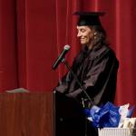 Catie Bursch delivers the keynote address at the Kachemak Bay Campus commencement last Wednesday, May 8, 2019, at the Mariner Theatre in Homer, Alaska. (Photo by Michael Armstrong/Homer News.)