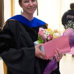 Emilie Springer smiles at a reception for the Kachemak Bay Campus commencement last Wednesday, May 8, 2019, at the Mariner Theatre in Homer, Alaska. A Homer resident from Ninilchik, Springer received a doctor of anthropology from the University of Alaska Fairbanks but chose to receive her PhD. in her home town  the first doctorate to do so at KBC commencement. (Photo by Michael Armstrong/Homer News.)