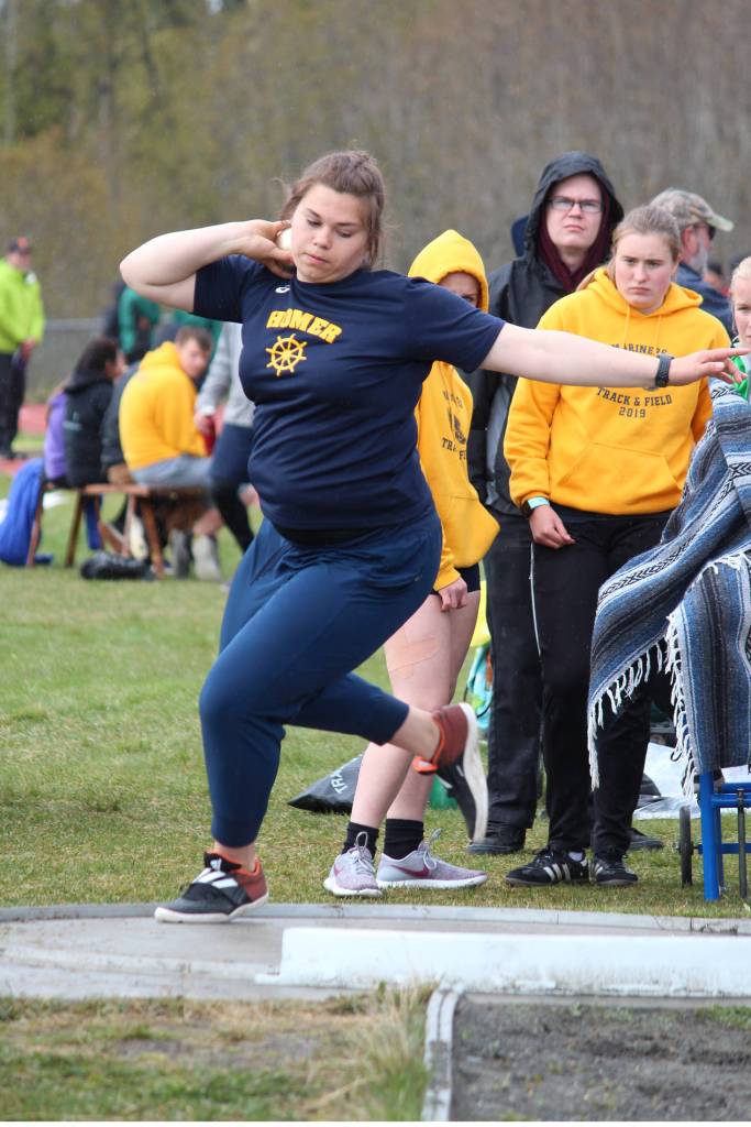 Homers Anna Brock winds up to throw the shot put during the Saturday, May 11, 2019 Kenai Peninsula Borough track and field meet at Homer High School in Homer, Alaska. (Photo by Megan Pacer/Homer News)