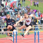 Kenais Savanna Wilson, right, and Soldotnas Holleigh Jaime (left) lead the girls 100-meter hurdles at the Saturday, May 11, 2019 Kenai Peninsula Borough track and field meet at Homer High School in Homer, Alaska. (Photo by Megan Pacer/Homer News)