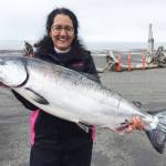 Derotha Ferraro from the fishing vessel Big Game poses with the king salmon she caught at the Anchor Point King Salmon Calcutta on Sunday, May 12, 2019, in Anchor Point, Alaska. Ferraros fish was one of the top ten fish caught in the tournament, weighing more than 20 pounds. (Photo courtesy of Bill Scott)
