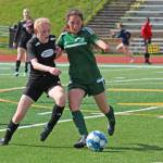 Nikiskis Cailin Yeager (left) and Sewards Belladonna Darby (right) battle for the ball during the first girls game of the Peninsula Conference Soccer Tournament on Thursday, May 16, 2019 at Homer High School in Homer, Alaska. (Photo by Megan Pacer/Homer News)