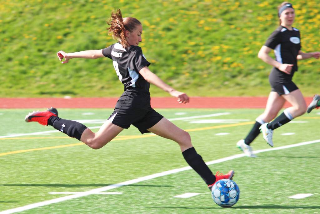 Nikiskis Rylee Ellis sends the ball up the field during the first girls game of the Peninsula Conference Soccer Tournament on Thursday, May 16, 2019 at Homer High School in Homer, Alaska. (Photo by Megan Pacer/Homer News)