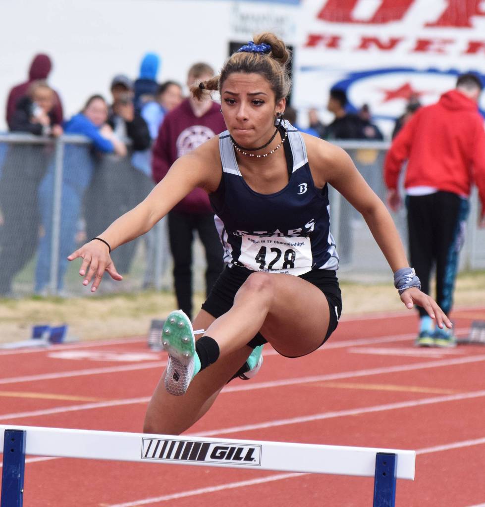 Soldotnas Holleigh Jaime races in the Class 4A girls 300-meter hurdles final Saturday, May 18, 2019, at the Region III Track and Field Championships in Soldotna, Alaska. (Photo by Joey Klecka/Peninsula Clarion)