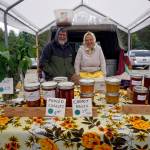 Dan and Luba Dorvall of Nikolaevsk start another season at the opening of the Homer Farmers Market on Saturday, May 25, 2019, in Homer, Alaska. (Photo by Michael Armstrong/Homer News)