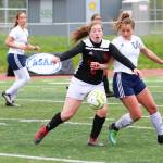 Juneaus Eva Goering (left) and Soldotnas Ryann Cannava battle for the ball during the final game of the Division II state soccer championships Saturday, May 25, 2019 at Service High School in Anchorage, Alaska. (Photo by Megan Pacer/Homer News)