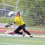 Thunder Mountain goalkeeper Samantha Dilley makes a save on a penalty kick from Soldotna during a semifinal game of the Division II state soccer championships on Friday, May 24, 2019 at Service High School in Anchorage, Alaska. (Photo by Megan Pacer/Homer News)
