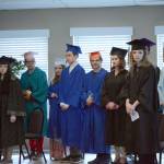 Flex School graduates stand before the start of graduation ceremonies on Wednesday, May 22, 2019, at Lands End Resort in Homer, Alaska. (Photo by Michael Armstrong/Homer News)