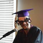 Colten Morris wears goofy glasses while he gives his graduation speech for the Flex School commencement ceremonies on Wednesday, May 22, 2019, at Lands End Resort in Homer, Alaska. In the small graduating classes of Flex, its traditional for graduates to each have the opportunity to speak. (Photo by Michael Armstrong/Homer News)