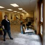Savanna Bradley, Pratt Museum collections manager, stands in the newly remodeled collections area on May 28, 2019, in Homer, Alaska. Some reorganization is ongoing, but when done, where shes standing will be a space for community meetings and talks. (Photo by Michael Armstrong/Homer News)
