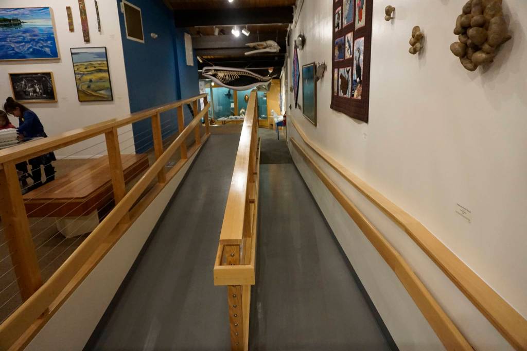 A new ramp connects the main floor of the Pratt Museum to the Marine Gallery, as seen here in this photo taken at the museums grand reopening on May 25, 2019, in Homer, Alaska. (Photo by Michael Armstrong/Homer News)