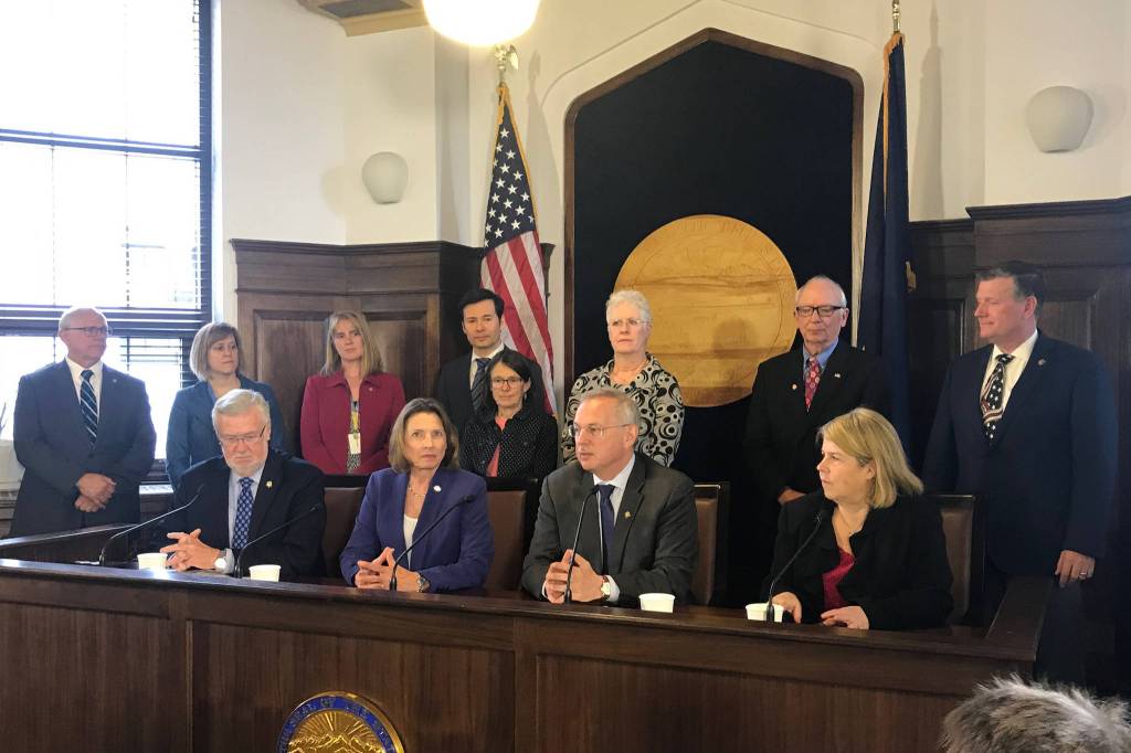 Members of the Alaska Legislatures Legislative Council prepare to speak to media members about preparing for a lawsuit against the governors administration over the future of education funding at the Alaska State Capitol on Tuesday, May 28, 2019. (Alex McCarthy | Juneau Empire)