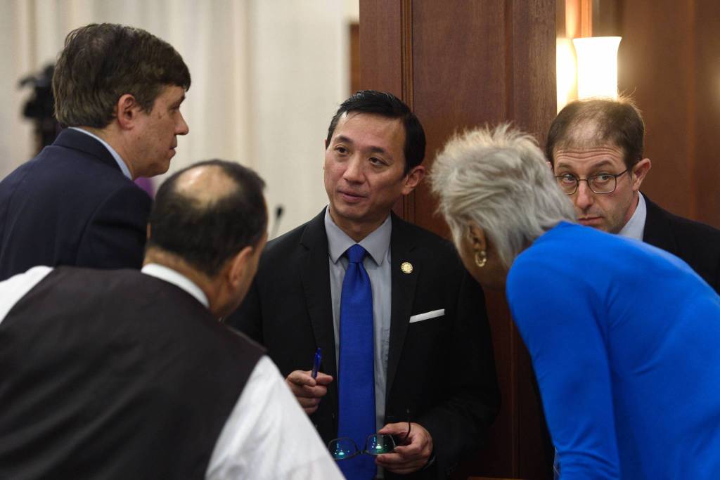 Senate Minority members caucus during debate on the size of the Alaska Permanent Fund Dividend in the Alaska Senate on Tuesday, June 4, 2019 in Juneau, Alaska. (Michael Penn | Juneau Empire)