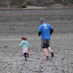Sara Reynolds, 3, didnt let age keep her out of the 5K Clam Scramble held Saturday, June 15, 2019 in Ninilchik, Alaska. Although too young to officially register for the fun run, the determined youngster ran beside her father, Jeff Reynolds. Not pictured are Sarahs mom, Tasha, and older sister, Avilyn, who also participated. (Photo by McKibben Jackinsky)