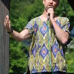 Doug Koester speaks to a crowd ahead of the second Homer Pride Walk on Saturday, June 22, 2019 at WKFL Park in Homer, Alaska. (Photo by Megan Pacer/Homer News)