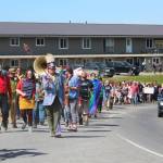 Participants in this years Pride Walk make their way up Ocean Drive on Saturday, June 22, 2019 in Homer, Alaska. (Photo by Megan Pacer/Homer News)