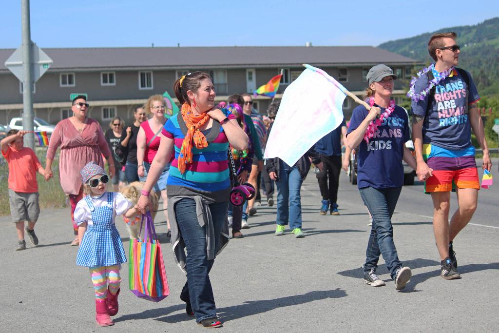 Participants in Homers second Pride Walk make their way up Ocean Drive on Saturday, June 22, 2019 in Homer, Alaska. (Photo by Megan Pacer/Homer News)