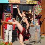 A member of the New Old Time Chautauqua parades down the Homer Spit on its visit in August 2011 in Homer, Alaska. (Homer News file photo)