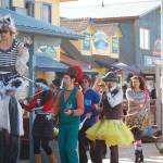 The New Old Time Chautauqua parades down the Homer Spit on its visit in August 2011 in Homer, Alaska. (Homer News file photo)