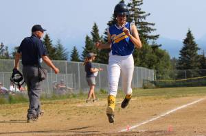 Homers Delilah Harris scores a run for the Tsunamis during Saturdays games against Kenai-Soldotnas Ak Riptide on June 29, 2019, at Jack Gist Field in Homer, Alaska. (Photo by McKibben Jackinsky)