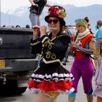 The New Old Time Chautauqua Fighting Instruments of Karma Marching Chamber Band Orchestra marches by the Salty Dawg on July 2, 2019, in Homer, Alaska. (Photo by Michael Armstrong/Homer News)