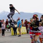 The New Old Time Chautauqua Fighting Instruments of Karma Marching Chamber Band Orchestra marches by the Salty Dawg on July 2, 2019, in Homer, Alaska. (Photo by Michael Armstrong/Homer News)