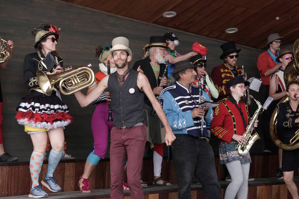 The New Old Time Chautauqua Fighting Instruments of Karma Marching Chamber Band Orchestra performs in the Homer Boathouse at the Homer Harbor on July 2, 2019, in Homer, Alaska. (Photo by Michael Armstrong/Homer News)