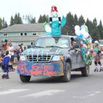 Members of the Spit City Sirens roller derby team make their way down Pioneer Avenue in this years July Fourth parade hosted by the Homer Chamber of Commerce on Thursday, July 4, 2019 in Homer, Alaska. (Photo by Megan Pacer/Homer News)