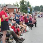 Onlookers cheer on participants in this years July Fourth parade hosted by the Homer Chamber of Commerce on Thursday, July 4, 2019 on Pioneer Avenue in Homer, Alaska. (Photo by Megan Pacer/Homer News)