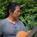 Musician Matt Yaki plays his guitar in a 2019 photo. (Photo provided)