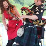 Rebecca Lomnicky and David Brewer of the Scottish music band The Fire perform along with bandmate Adam Hendey for the annual Kachemak Bay Highland Games on Saturday, July 6 2019 at Karen Hornaday Park in Homer, Alaska. (Photo by Megan Pacer/Homer News)