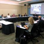 The University of Alaska Board of Regents meets in an emergency meeting in Anchorage, Alaska Monday, July 22, 2019. Regents voted 10-1 to declare a financial exigency, allowing administrators to expedite layoffs of tenured faculty in the face of severe budget issues. (AP Photo/Dan Joling)