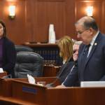 Sen. Lora Reinbold, R-Eagle River, watches as Senate Majority Leader Lyman Hoffman, R-Bethel, interrupts with a point of order during debate on the operating budget at the Capitol on Monday, July 29, 2019. (Michael Penn | Juneau Empire)