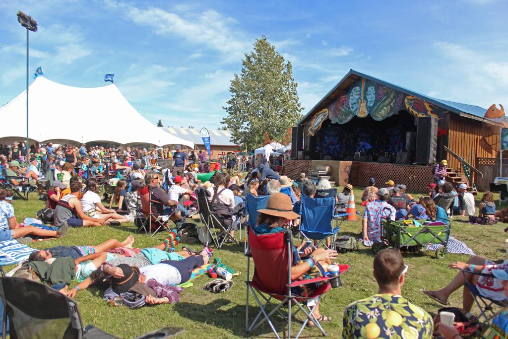 Specators listen to music during the second day of this years Salmonfest on Saturday, Aug. 3, 2019 in Ninilchik, Alaska. (Photo by Megan Pacer/Homer News)