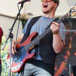 Ben Sayers, bass player for Blackwater Railroad Company, performs with the band on the River Stage on Friday, Aug. 2, 2019 at Salmonfest in Ninilchik, Alaska. (Photo by Megan Pacer/Homer News)