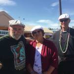 From left, Tim Troll, Kate Mitchell and Dave Seaman stand in front of LML 144 on Sunday, Aug. 4, 2019, at Salmonfest in Ninilchik, Alaska. They are organizing Sailing Back to the Bay 2020, which will take the one-time fishing vessel from Homer to Bristol Bay. (Photo by McKibben Jackinsky)