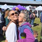 Monet Barbee, left and Judy Casey, right, pose for the camera during Salmonfest 2019 in Ninilchik, Alaska on August 2, 2019. (Photo by Brian Mazurek/Peninsula Clarion)