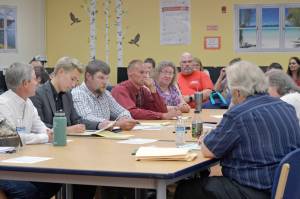 The Kenai Peninsula Borough School District and two employee associations  The Kenai Peninsula Borough Education Association and the Kenai Peninsula Borough Education Support Association  negotiate for a new contract on Tuesday, Aug. 13, 2019, at the Soldotna High School Library, in Soldotna, Alaska. (Photo by Victoria Petersen/Peninsula Clarion)
