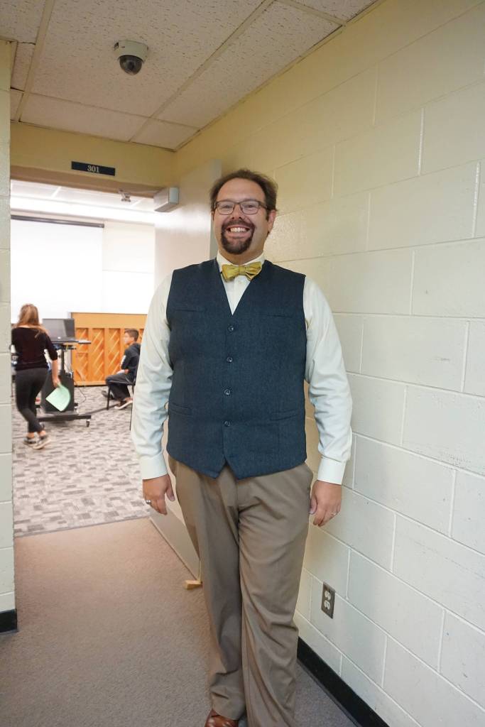 Choir teacher Kyle Schneider greets students at the start of Homer Middle School on Tuesday, Aug. 20, 2019, in Homer, Alaska. Schneider also teaches choir at Homer High School. (Photo by Michael Armstrong/Homer News)