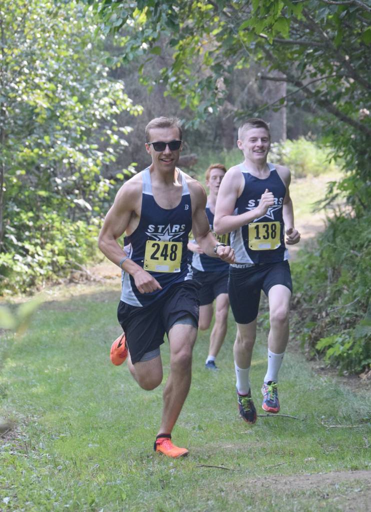 Photo by Jeff Helminiak/Peninsula Clarion                                 Eventual winner Bradley Walters leads Lance Chilton on Monday, Aug. 19, 2019, at the Nikiski Class Races in Nikiski, Alaska.